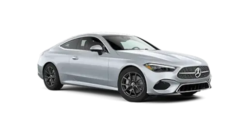 Silver Mercedes-Benz luxury two-door coupe shown in a front three-quarter view, featuring sleek LED headlights, a prominent Mercedes grille emblem, sculpted bodywork, dark alloy wheels, and a sporty aerodynamic design on a transparent background.